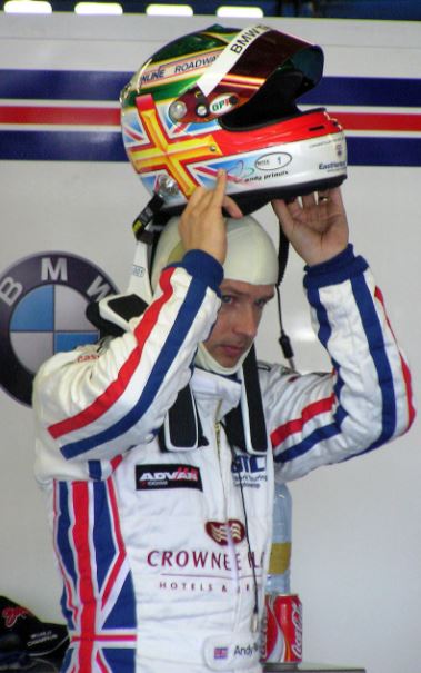 WTCC Champion Andy Priaulx with a HANS device