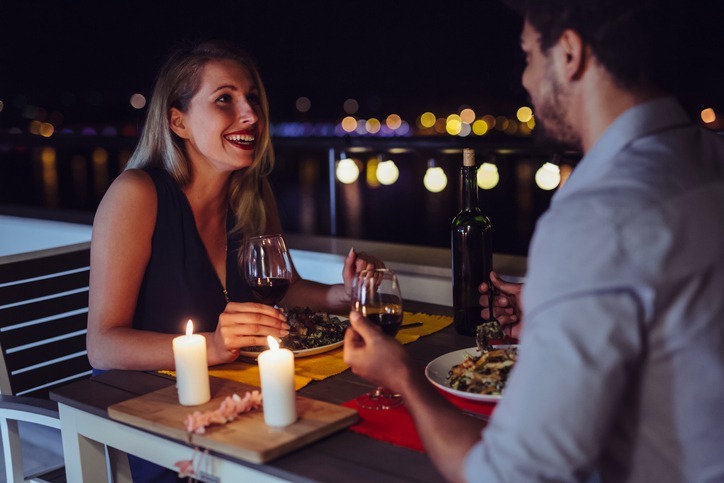 A couple having dinner at a patio